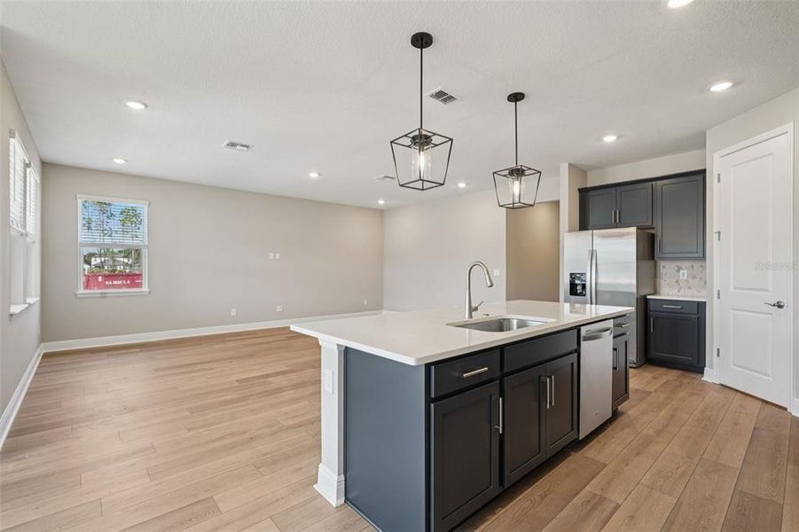 Furnished interior view inside a new home in Legends Preserve - Signature Series, Daytona Beach (Image 8). Furnished interior view inside a new home in Legends Preserve - Signature Series, Daytona Beach (Image 8).