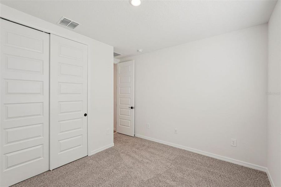 Spacious, unfurnished interior of a new home in Oakfield Trails - Signature Series, Parrish (Image 27).