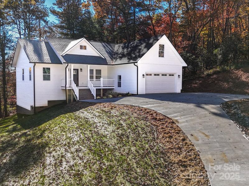 Front exterior of a new home in , Horse Shoe, NC, highlighting curb appeal (Image 1). Front exterior of a new home in , Horse Shoe, NC, highlighting curb appeal (Image 1).