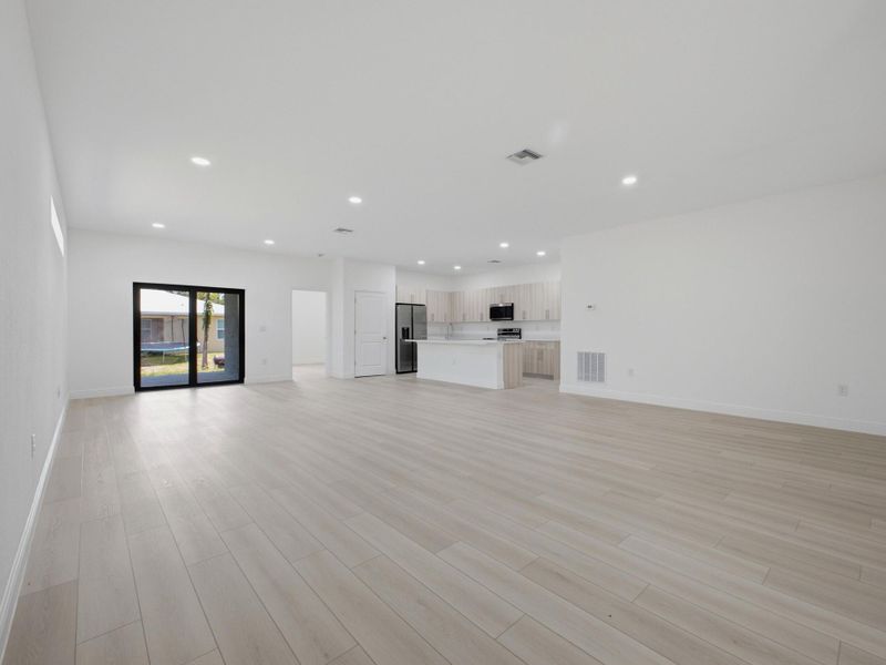 Foyer to Dining Kitchen Living