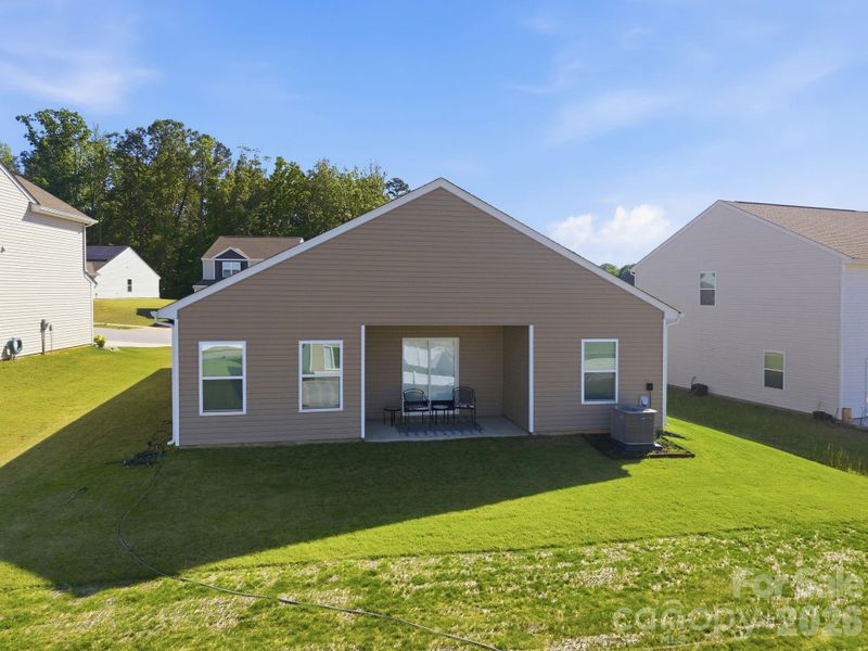 Exterior details and patio area of a home in Stagecoach Station, Gastonia (Image 26).