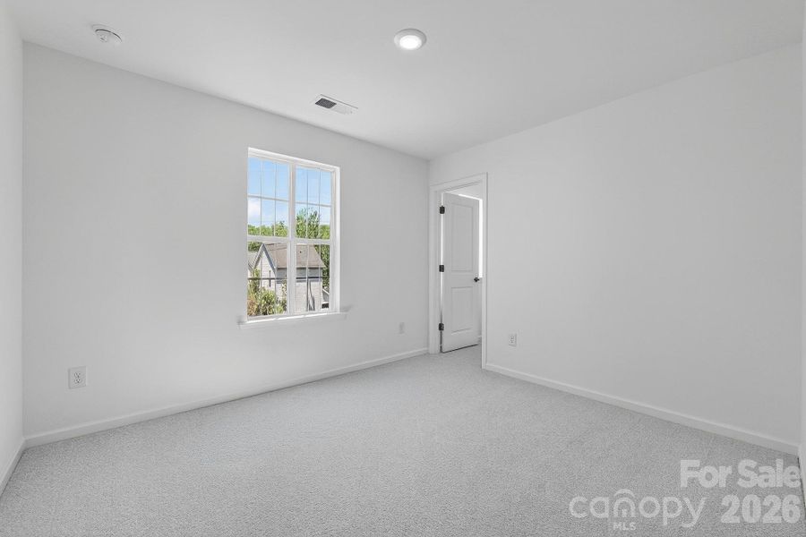 Spacious, unfurnished interior of a new home in The Vines, Charlotte (Image 14).
