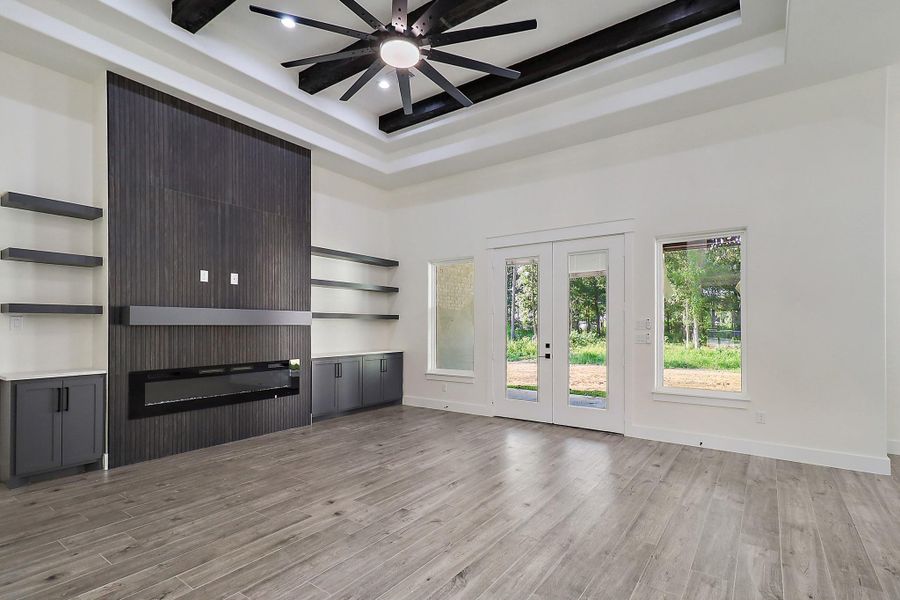 Built in fireplace with accent wall in living room Built in fireplace with accent wall in living room