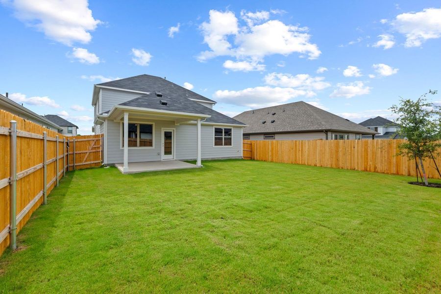 Exterior details and patio area of a home in Prairie Winds, Hutto (Image 20).