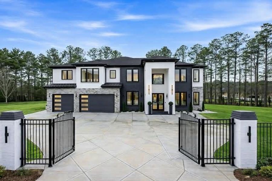 Front exterior of a new home in , Buford, GA, highlighting curb appeal (Image 28).