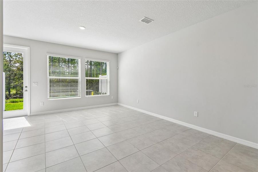 Spacious, unfurnished interior of a new home in Preserve at The Cays – The Driftwood Series, Daytona Beach (Image 18). Spacious, unfurnished interior of a new home in Preserve at The Cays – The Driftwood Series, Daytona Beach (Image 18).