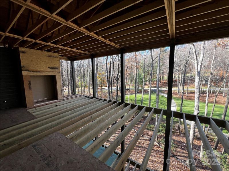 This statement screen porch is oversized and overlooks the 7th tee box This statement screen porch is oversized and overlooks the 7th tee box