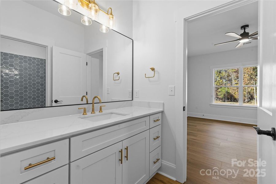 *representative photo- jack & jill full bath connecting bedrooms 3 & 4. pocket door and separate commode room