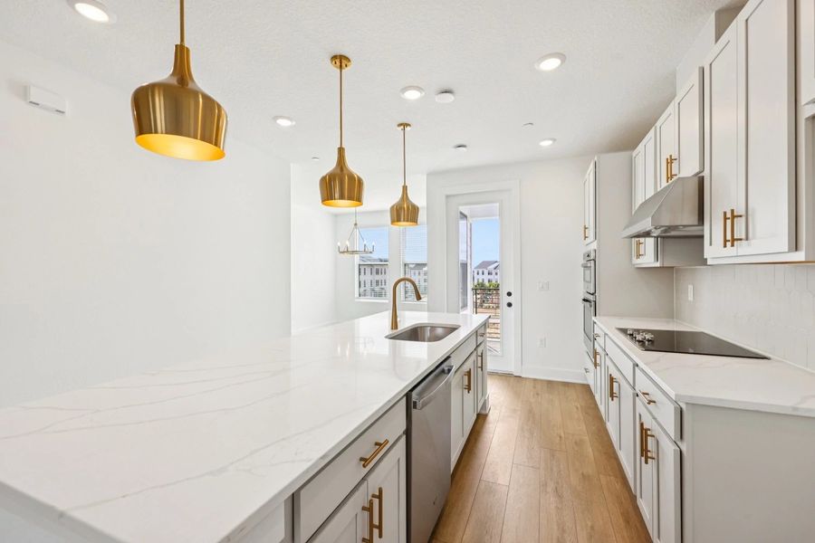 Furnished interior view inside a new home in Parkview at Hamlin, Winter Garden (Image 9).