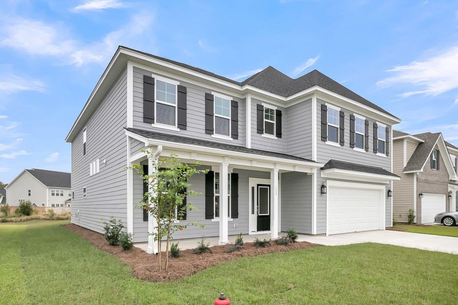 Front exterior of a new home in , Summerville, SC, highlighting curb appeal (Image 2).