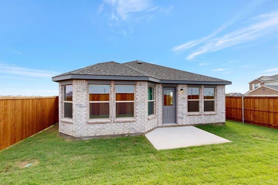 Exterior details and patio area of a home in Mobberly Farms, Pilot Point (Image 22). Exterior details and patio area of a home in Mobberly Farms, Pilot Point (Image 22).