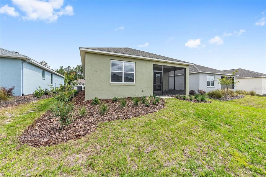 Exterior details and patio area of a home in On Top of the World Communities, Ocala (Image 10).