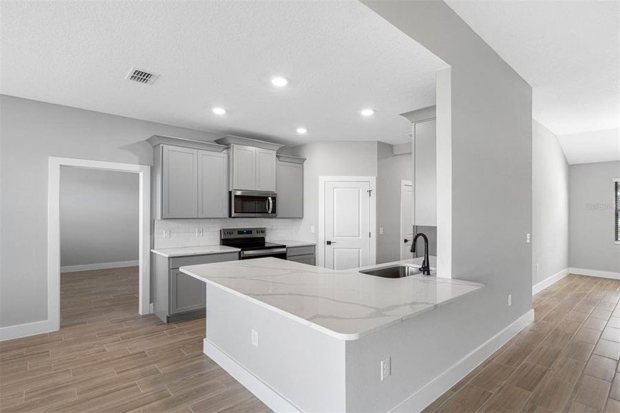 Furnished interior view inside a new home in Lake Gallagher Estates, Dover (Image 5).