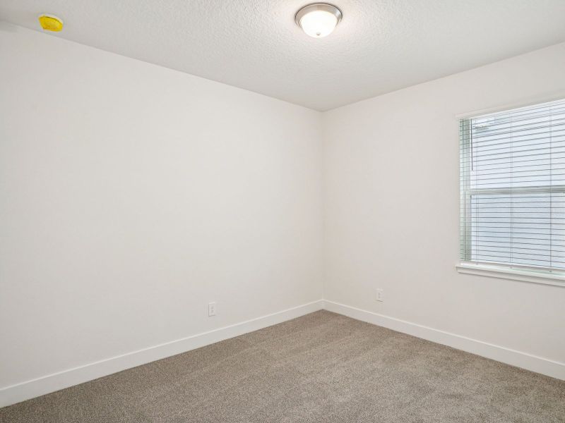 Spacious, unfurnished interior of a new home in Ridgehaven - Signature Series, Ormond Beach (Image 12).