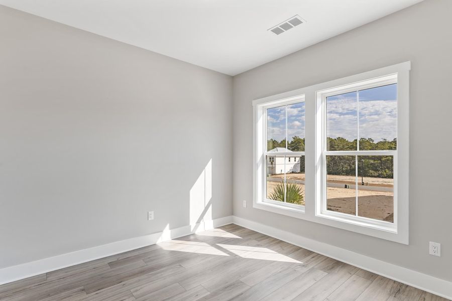 Representative unfurnished interior of a home built from the Pearl by Brock Built in Nautilus Pointe, Inlet Beach (Image 30).