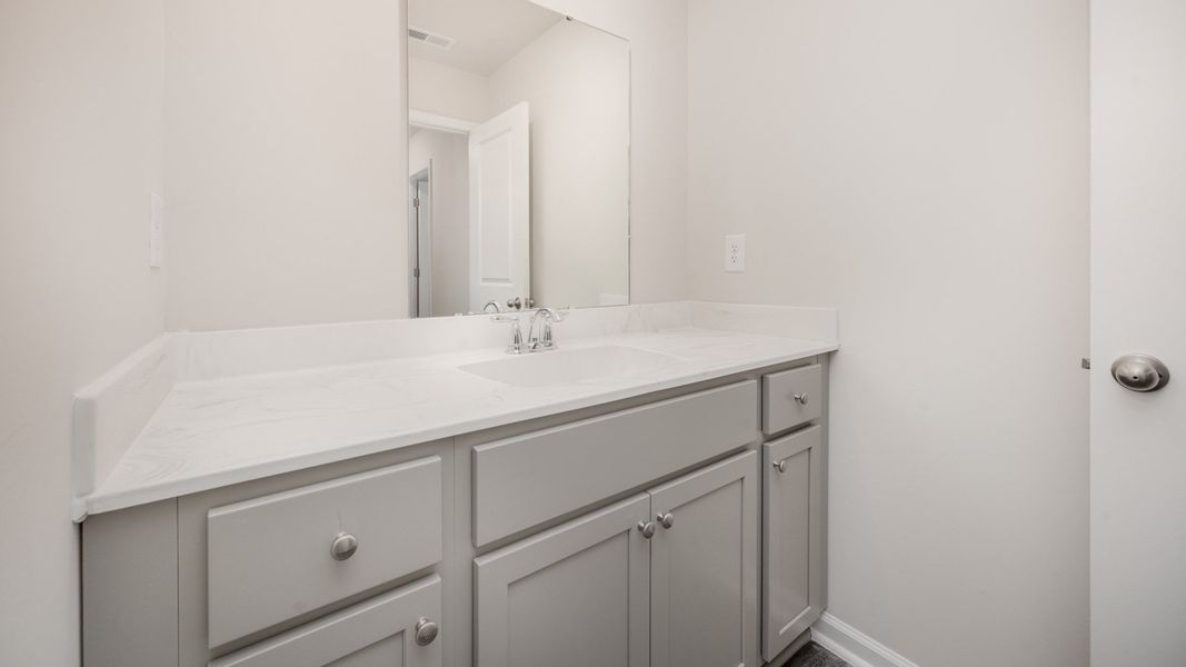 Representative furnished interior of a home built from the WREN by D.R. Horton in Sidbury Station, Castle Hayne (Image 11).