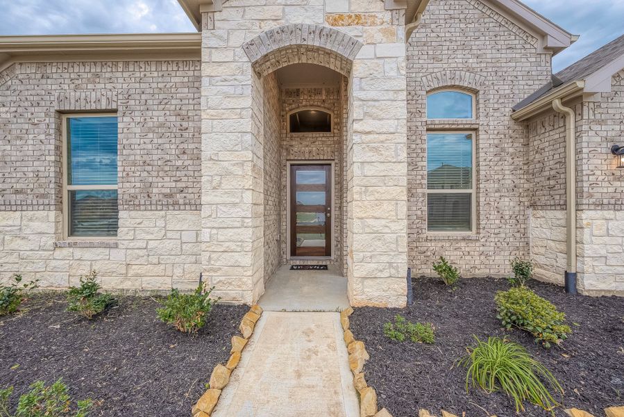 Representative exterior details of a home built from the Floor Plan 2050 by Colina Homes in Grand Magnolia, Magnolia (Image 3).