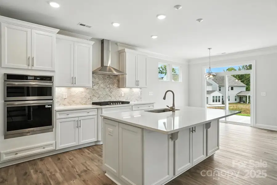 Furnished interior view inside a new home in Hampton Woods, Charlotte (Image 5).