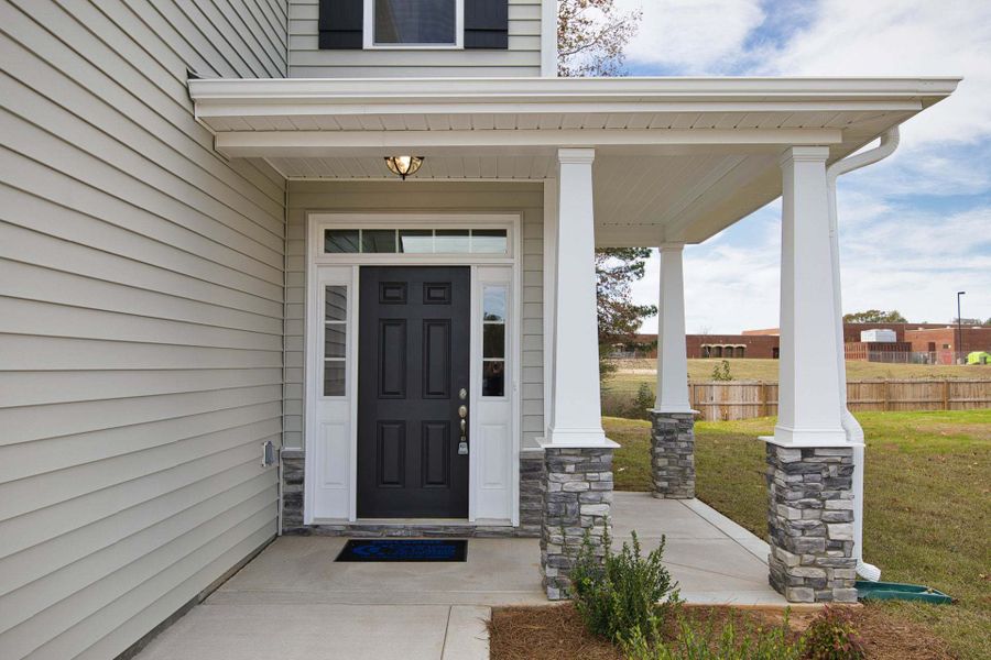 Representative exterior photo of a completed home built from the Springfield by Caviness & Cates Communities in Sutherland Station at Olde Liberty, Franklinton, NC (Image 81). Representative exterior photo of a completed home built from the Springfield by Caviness & Cates Communities in Sutherland Station at Olde Liberty, Franklinton, NC (Image 81).