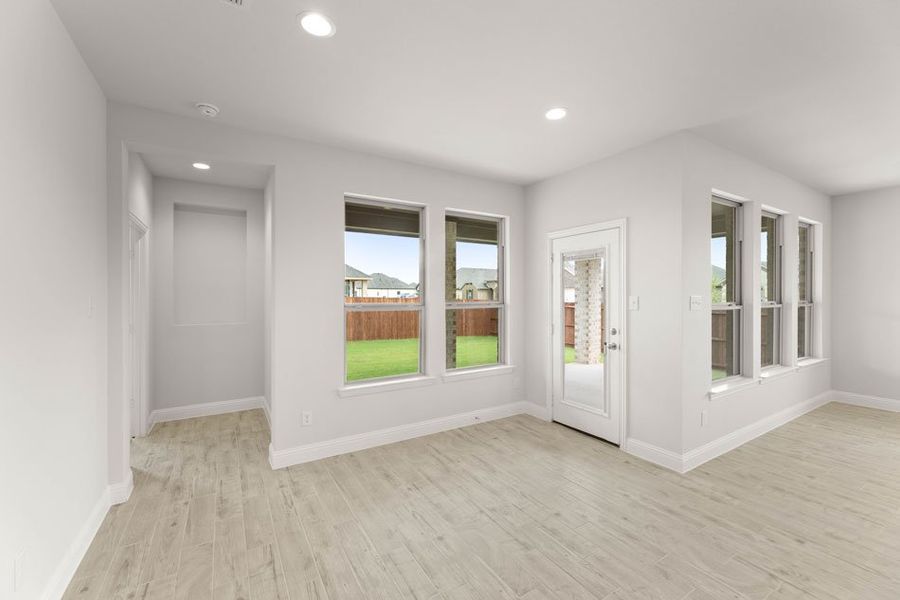 Representative exterior photo of a completed home built from the Winchester by Impression Homes in Timberbrook, Justin, TX (Image 11).