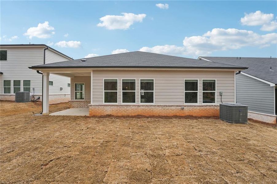 Exterior details and patio area of a home in Westmont Preserve, Powder Springs (Image 30).