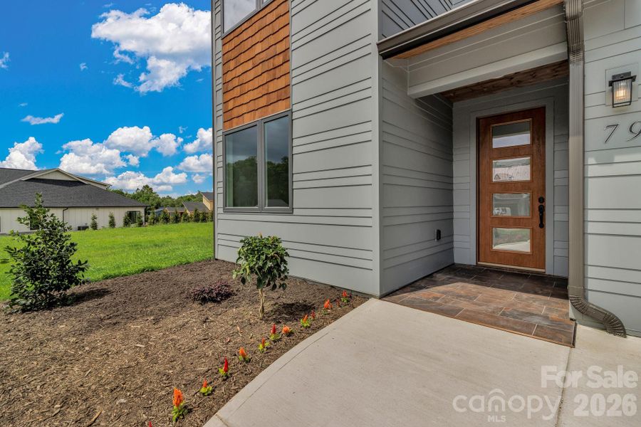 Exterior details and patio area of a home in , Asheville (Image 29).