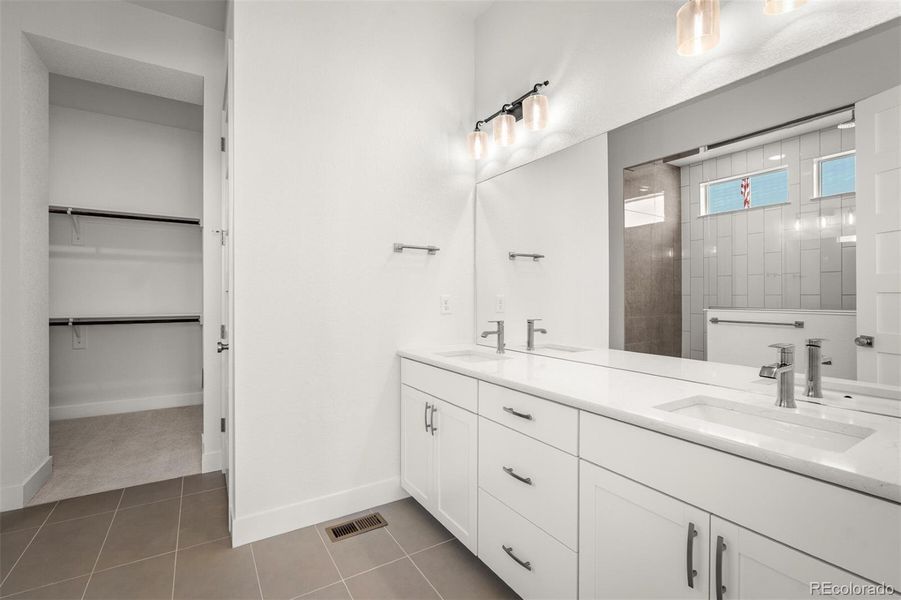 Furnished interior view inside a new home in Cloverleaf - Pinnacle Collection, Monument (Image 13).