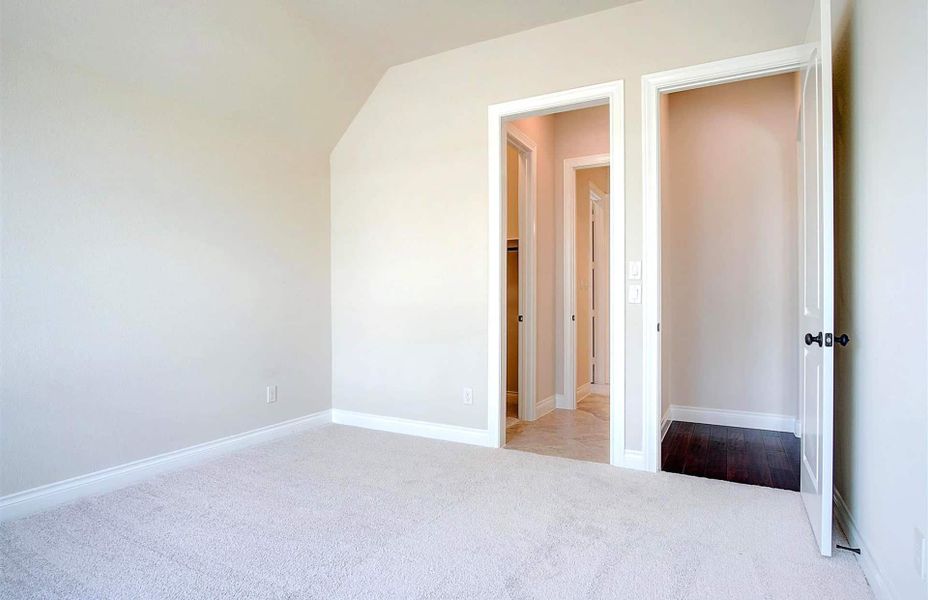 Representative unfurnished interior of a home built from the 3710 by Ravenna Homes in Artavia 70′, Conroe (Image 38).