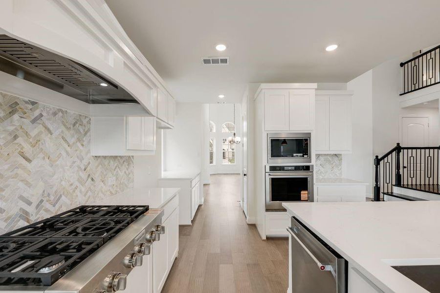 Furnished interior view inside a new home in Grand Braniff Park, Irving (Image 6).