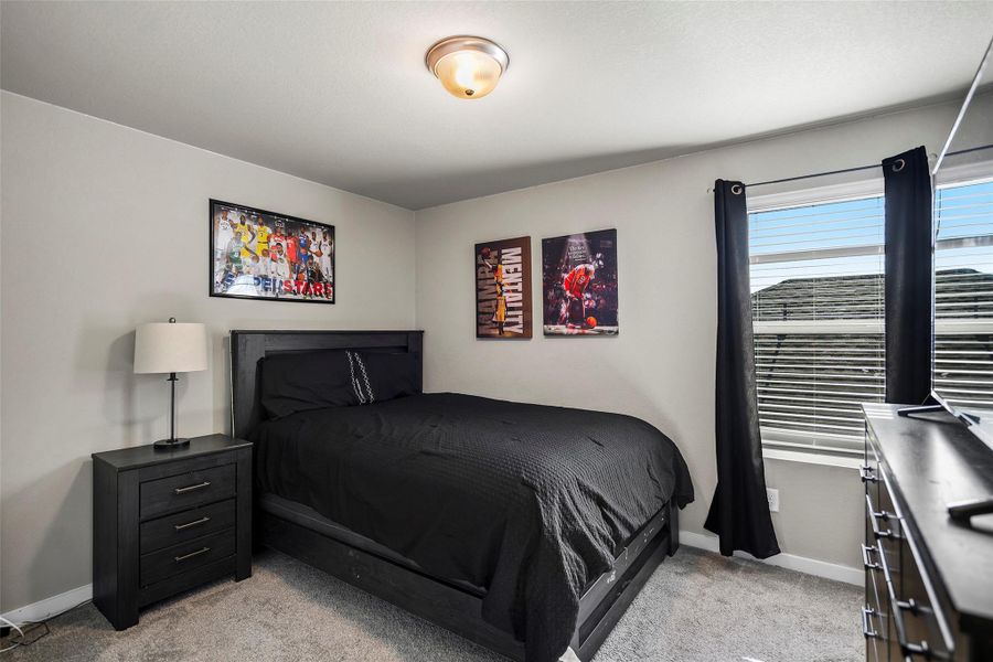 Upstairs Bedroom 3 with a private bathroom.