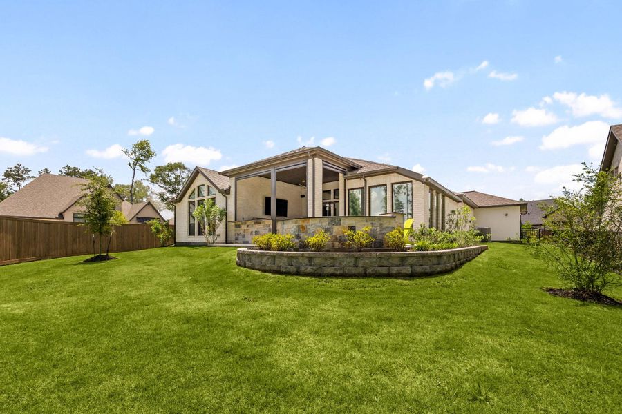 Exterior details and patio area of a home in The Highlands, Porter (Image 31).