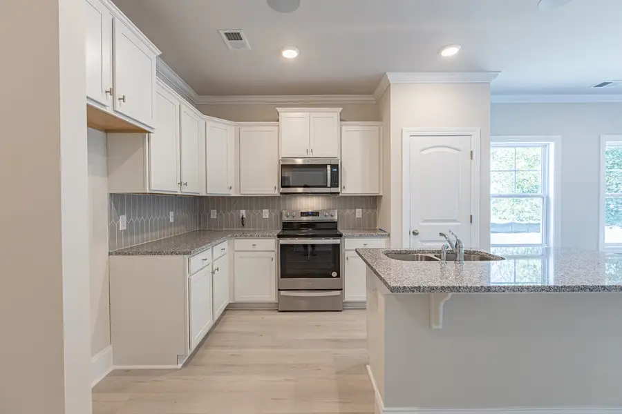 Representative furnished interior of a home built from the Habersham II by Great Southern Homes in Old Charleston Acres, Pelion (Image 4).