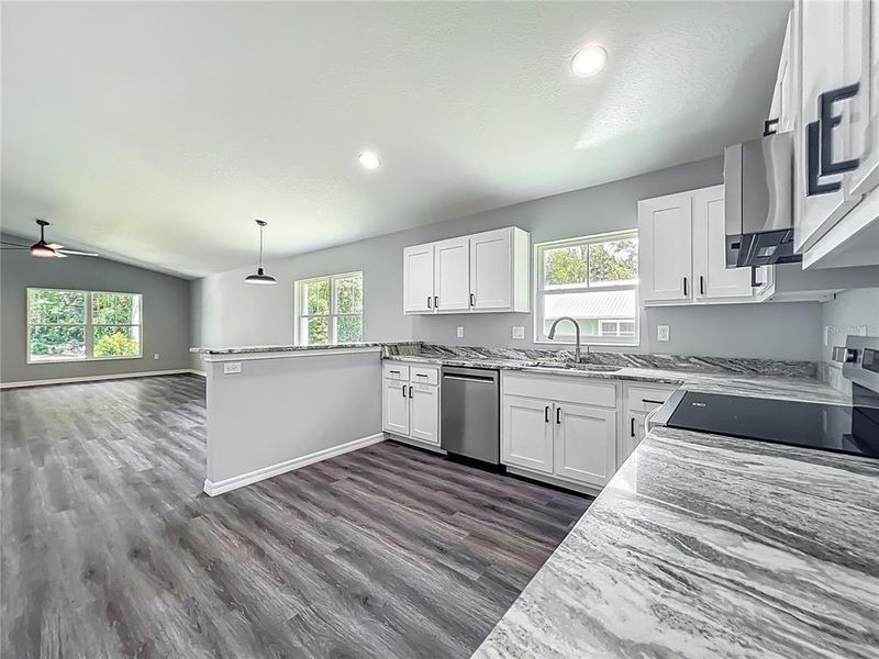 Furnished interior view inside a new home in , Lake Panasoffkee (Image 10).