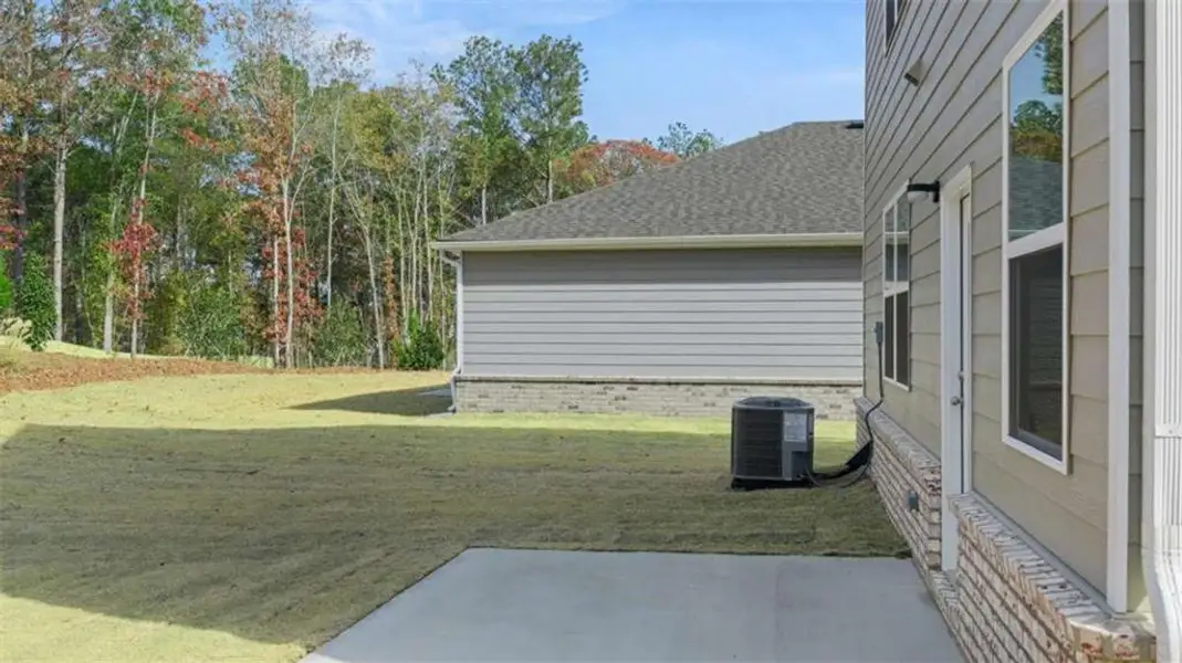 Exterior details and patio area of a home in WillowBrook, Winder (Image 21).