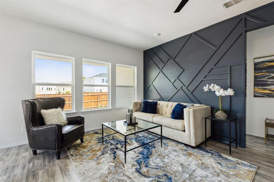 Living room featuring hardwood / wood-style flooring