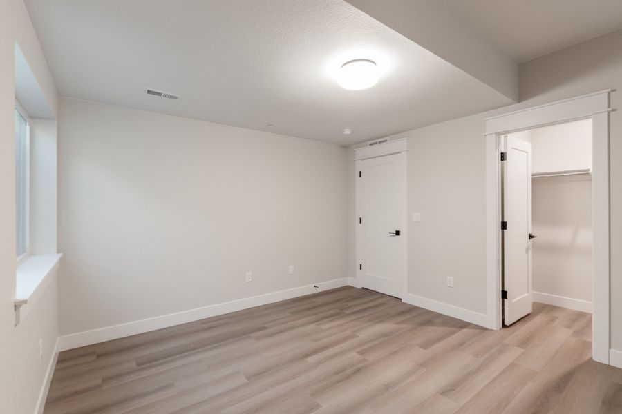 Representative unfurnished interior of a home built from the Luxe by Scott Felder Homes in Westerly, Erie (Image 44).