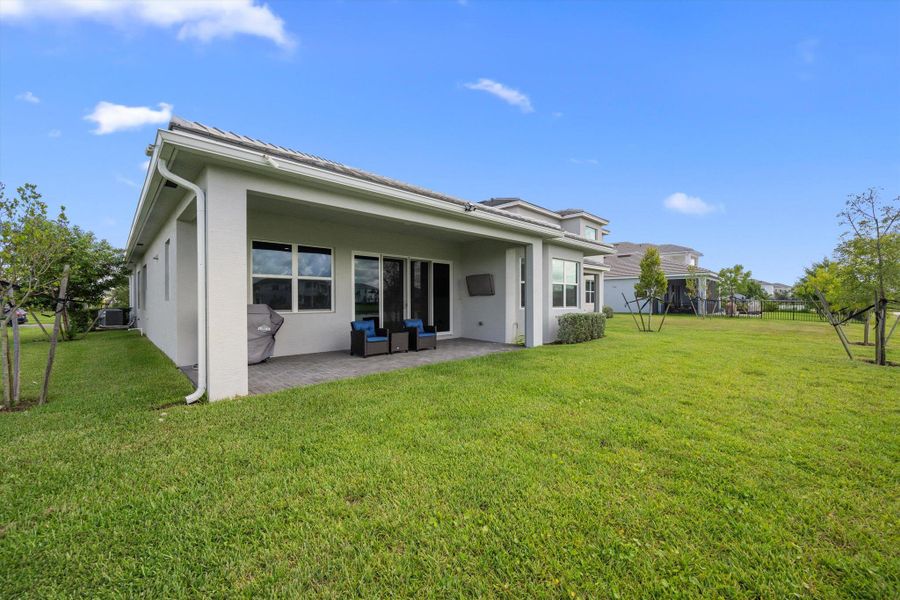 Front exterior of a new home in , Westlake, FL, highlighting curb appeal (Image 33).
