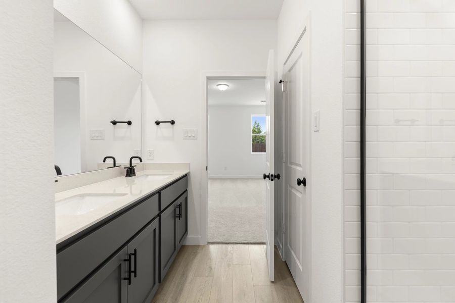 Primary Bathroom Representative Photo featuring the Minimalist Collection Primary Bathroom Representative Photo featuring the Minimalist Collection
