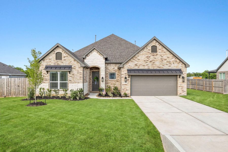 Front exterior of a new home in , Old River-Winfree, TX, highlighting curb appeal (Image 21).