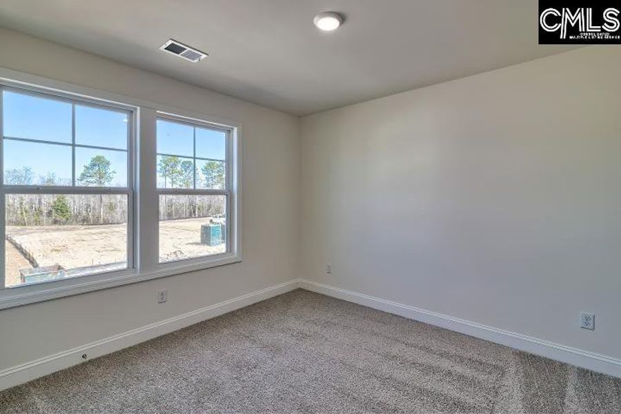 Spacious, unfurnished interior of a new home in Cottages at Roofs Pond, West Columbia (Image 34).