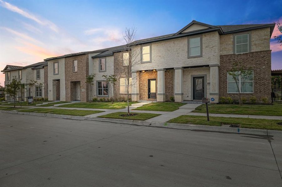 Front exterior of a new home in , Rowlett, TX, highlighting curb appeal (Image 25).