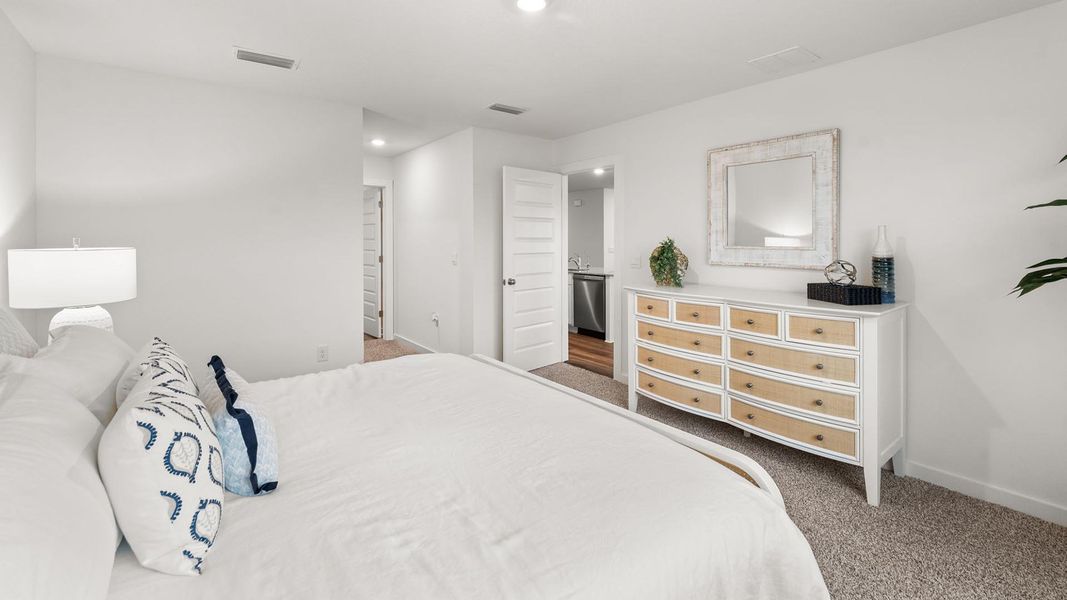 Furnished interior view inside a new home in Magnolia at the Bluffs Phase 3, Freeport (Image 23).