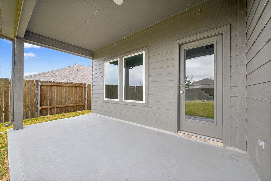 Exterior details and patio area of a home in Water Crest on Lake Conroe, Conroe (Image 31).