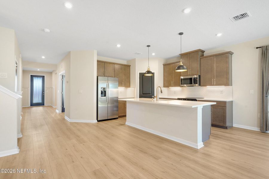 Furnished interior view inside a new home in Seminole Palms Single-Family Homes, Palm Coast (Image 8).