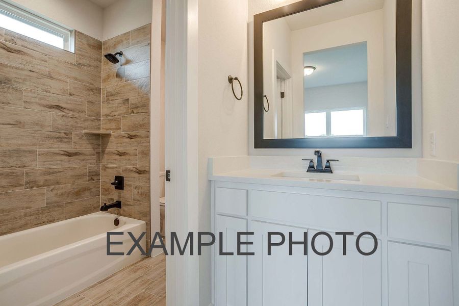 Representative furnished interior of a home built from the The Iris by Kenmark Homes in Rocky Top Ranch, Reno (Image 18).