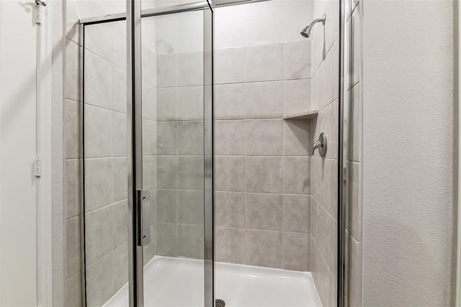 Furnished interior view inside a new home in Caney Creek Place, Conroe (Image 46).