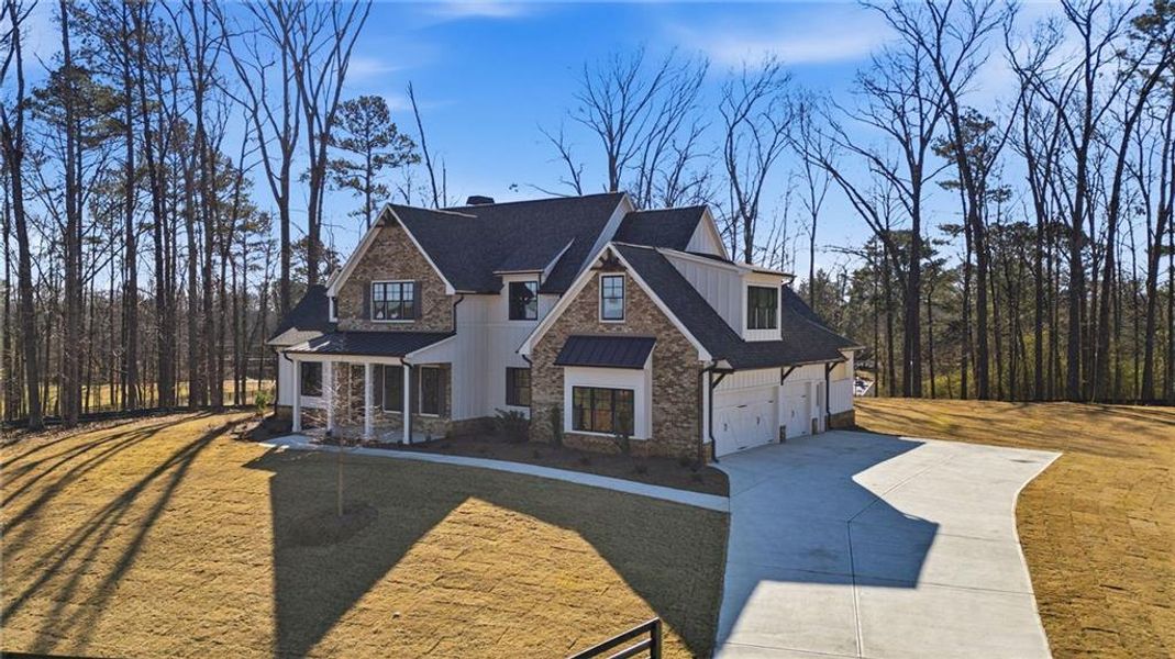 Front exterior of a new home in , Canton, GA, highlighting curb appeal (Image 25).