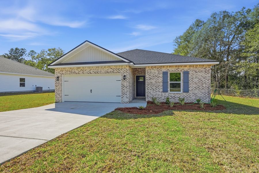 Front exterior of a new home in McCarthy Estates, Defuniak Springs, FL, highlighting curb appeal (Image 2). Front exterior of a new home in McCarthy Estates, Defuniak Springs, FL, highlighting curb appeal (Image 2).