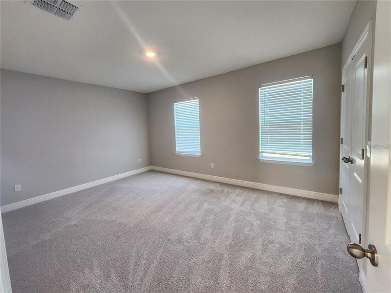 Spacious, unfurnished interior of a new home in Woodcreek, Wesley Chapel (Image 23).