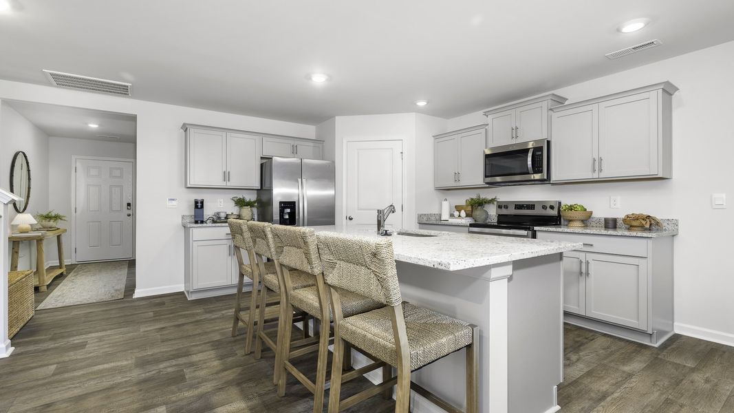 Representative furnished interior of a home built from the Hayden by D.R. Horton in Fiddlers Landing, Winston-Salem (Image 10).